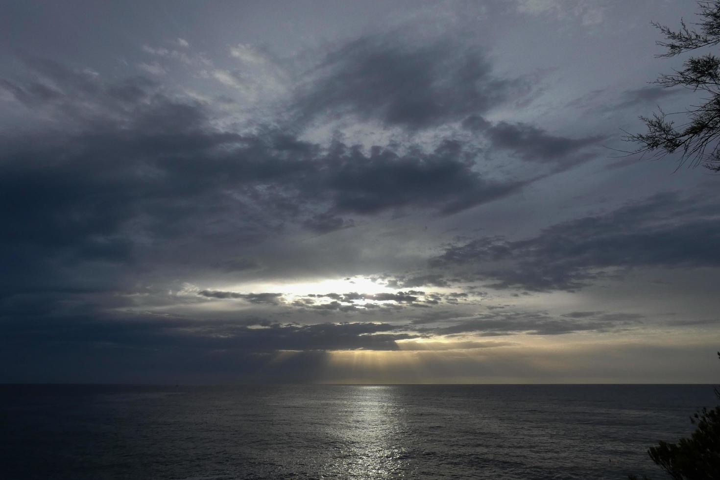 Clouds and light effects in the sky at dawn or dusk. photo