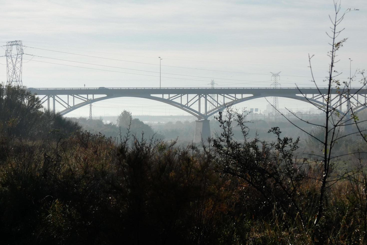 Modern bridge spanning a river, an engineering feat photo