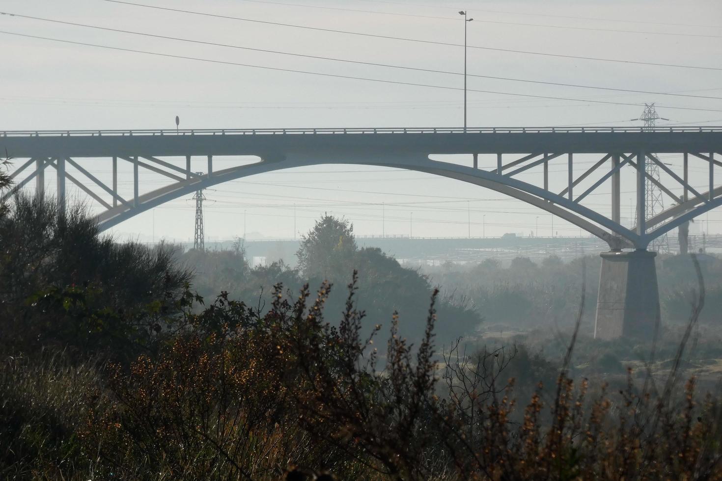 Modern bridge spanning a river, an engineering feat photo