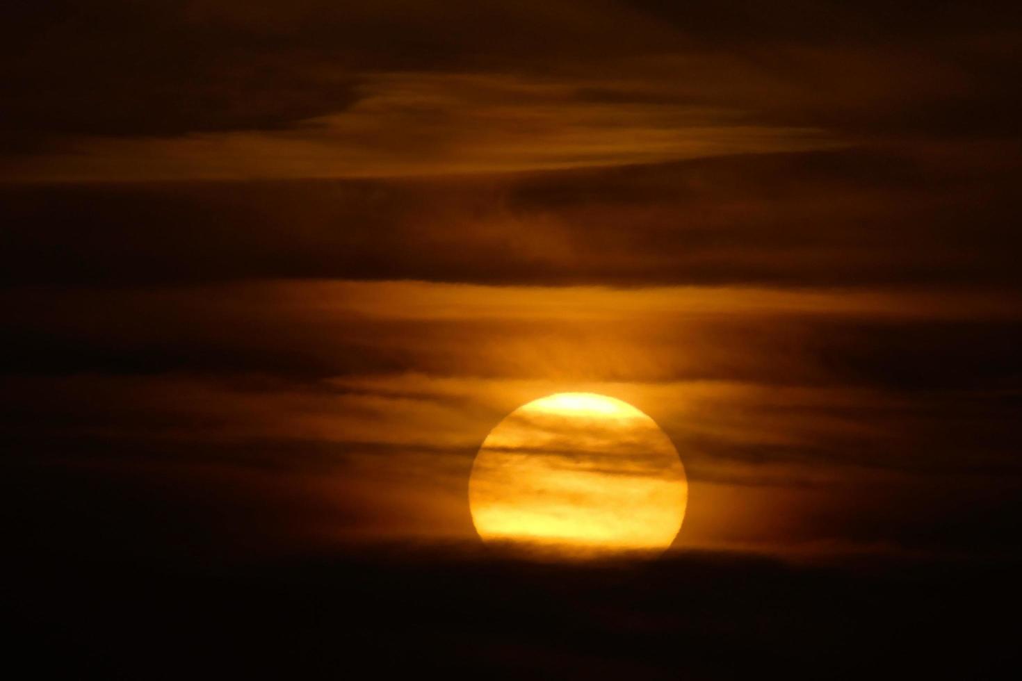 sun the sun, at sunset at the end of the day, essential for the life of the planet photo