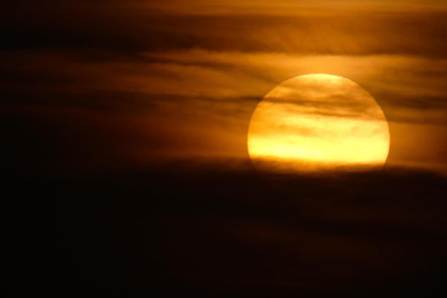 sun the sun, at sunset at the end of the day, essential for the life of the planet photo