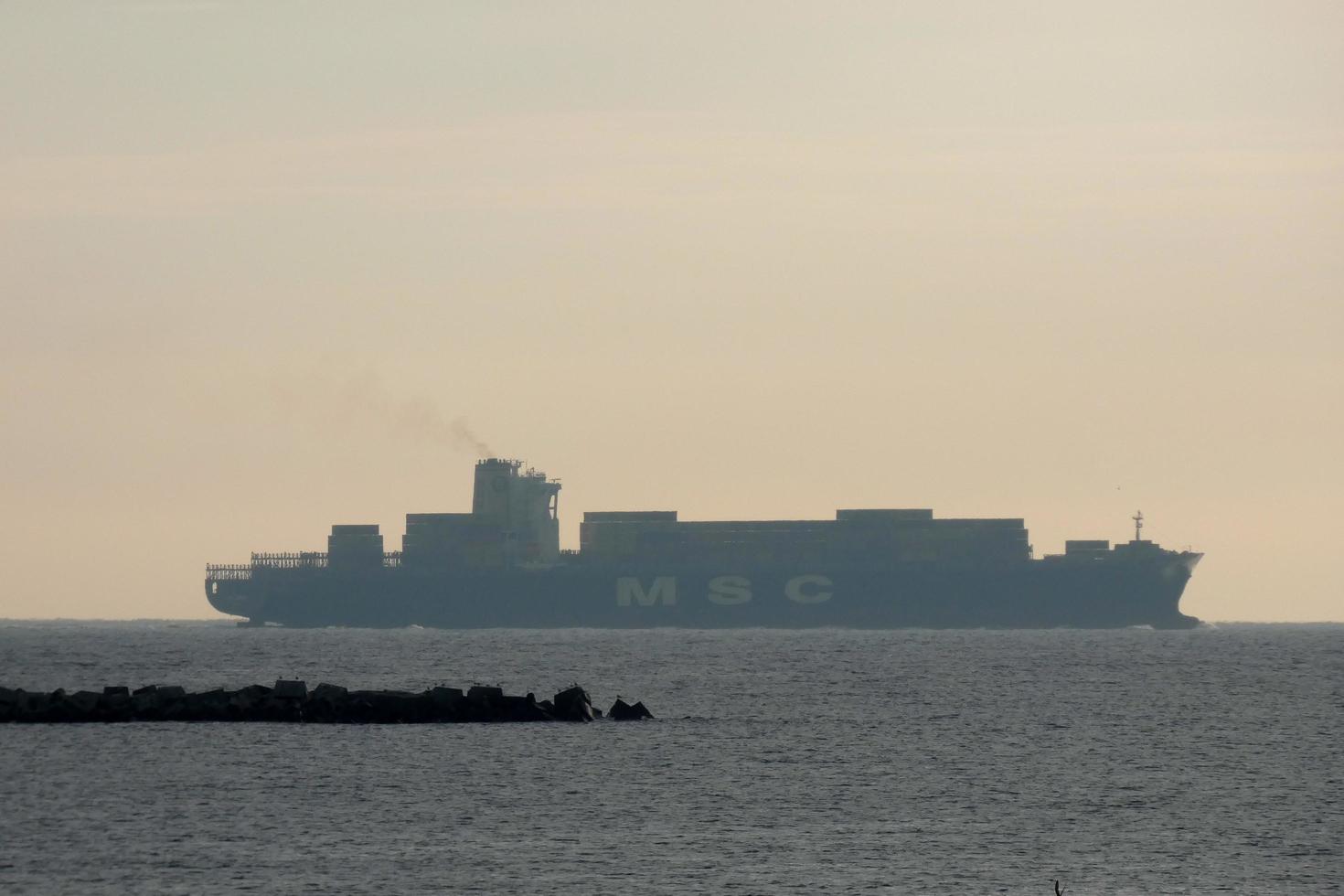 Cargo ships entering or leaving the port photo