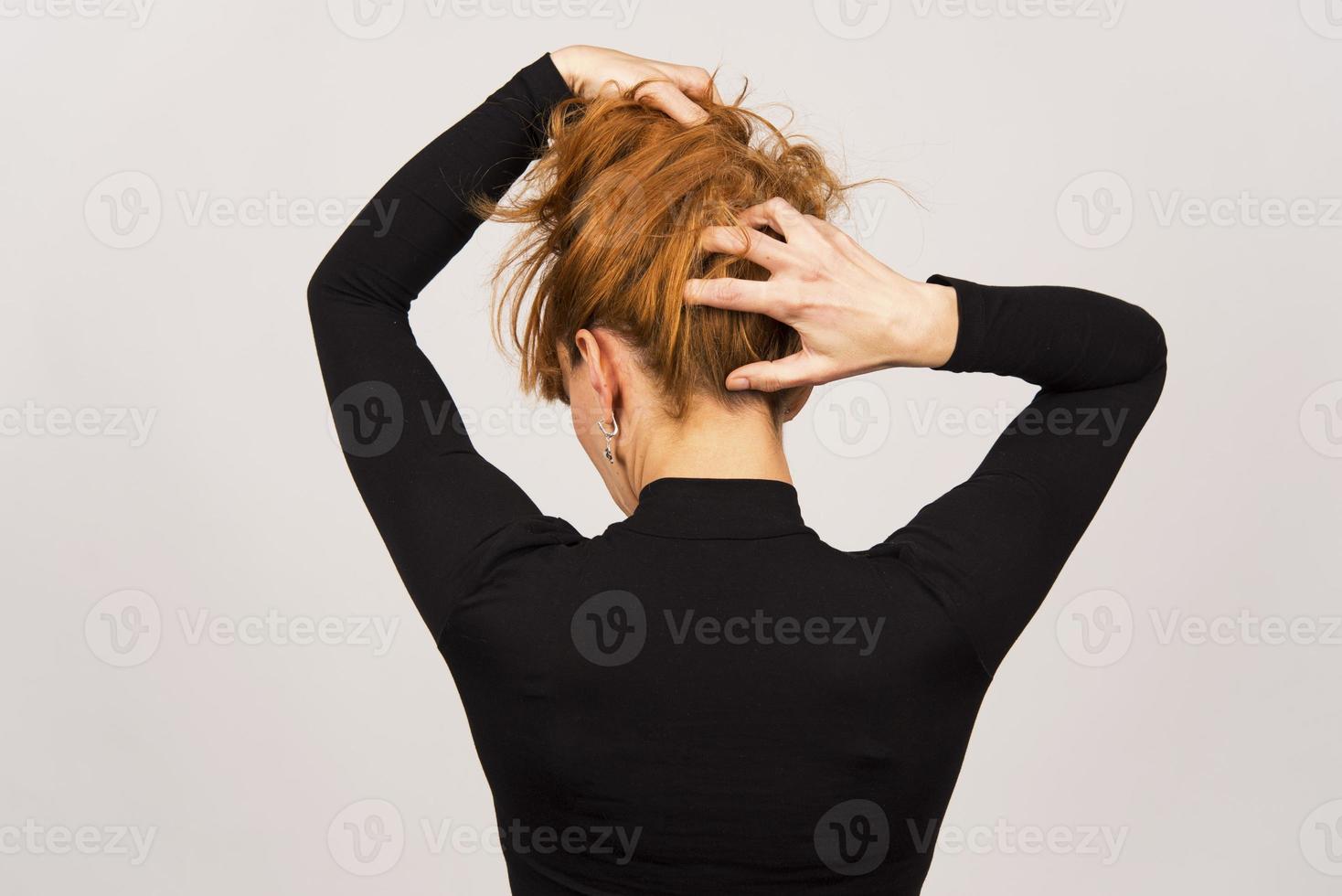 back view Portrait of young woman tied her hair photo