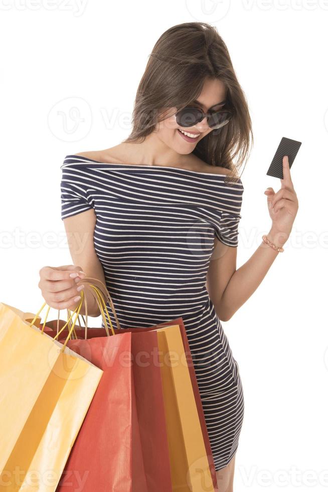 Young Modern Beautiful woman with a lot of shopping bags photo