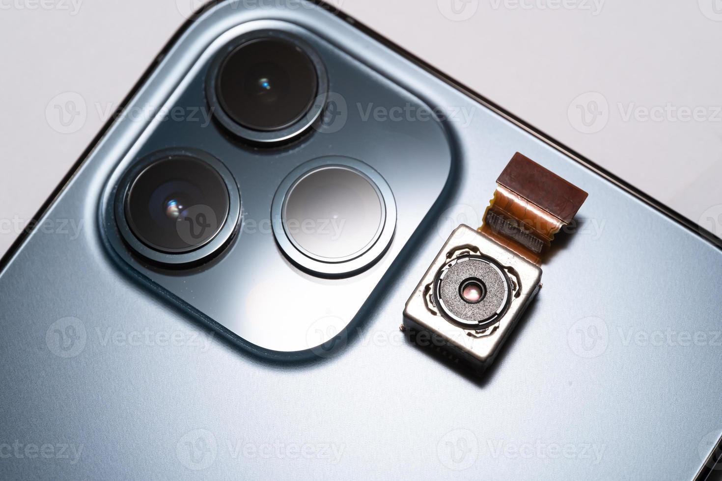 camera modules being used in mobile phones. development of mobile cameras. Digital camera lens part. sensor and technology smartphone new high resolution cameras. Mobile phone camera module photo