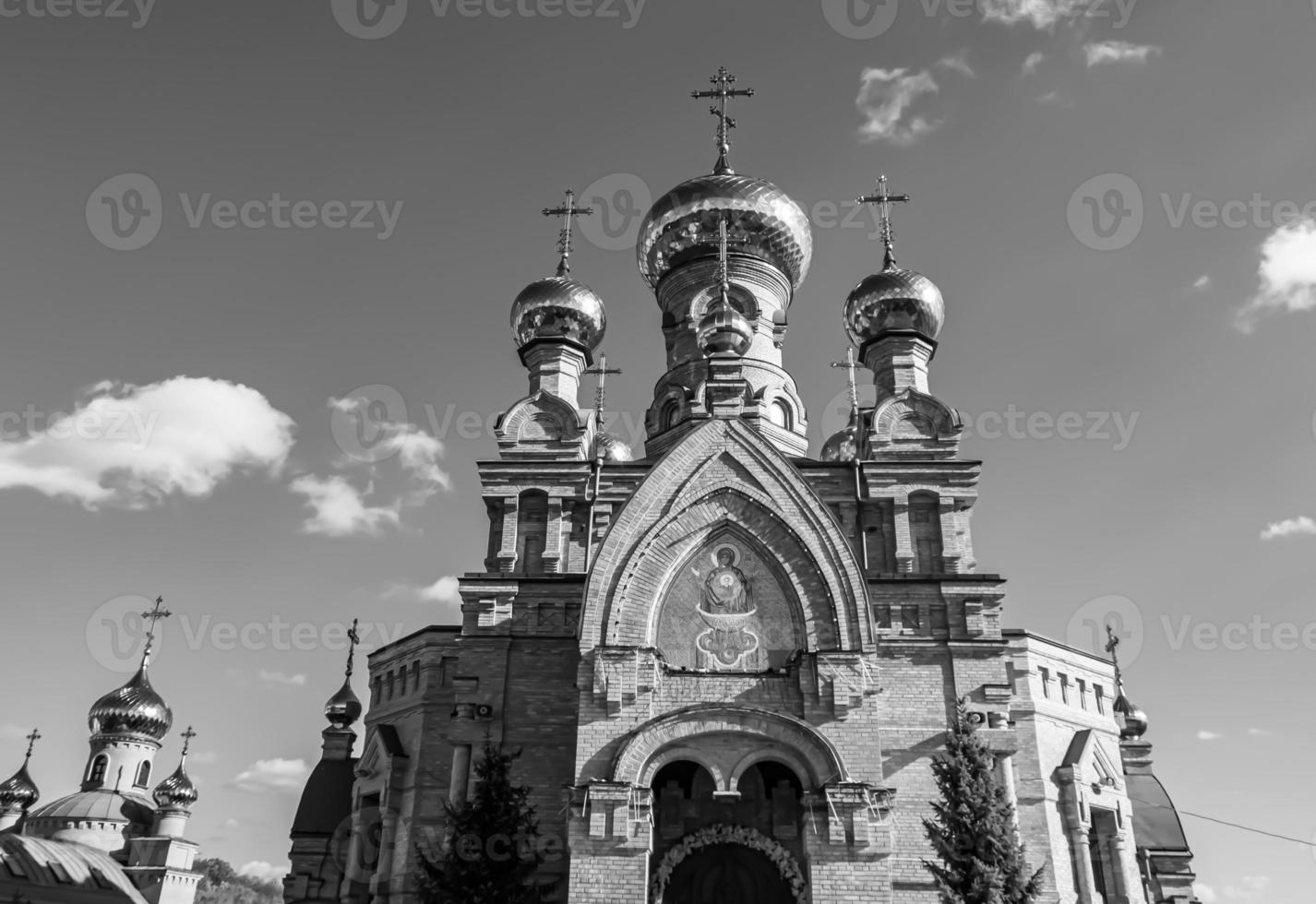 Christian church cross in high steeple tower for prayer photo