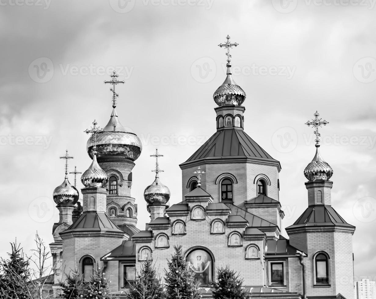 Christian church cross in high steeple tower for prayer photo