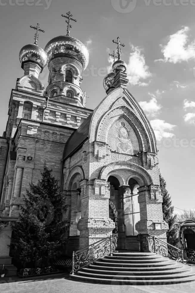 Christian church cross in high steeple tower for prayer photo