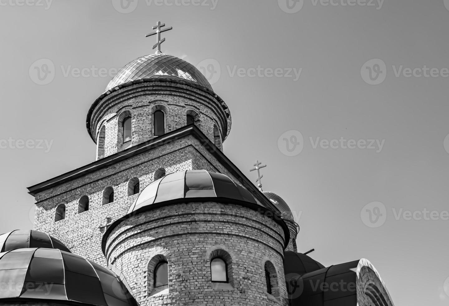 Christian church cross in high steeple tower for prayer photo