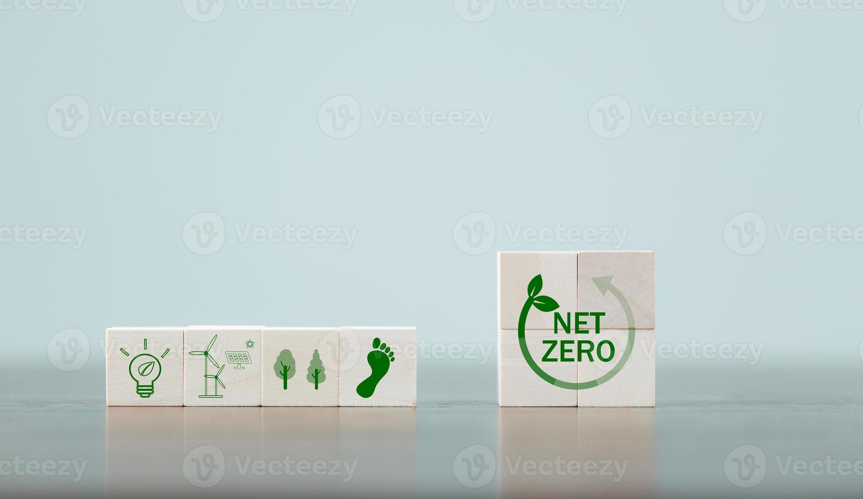 Companies are targeting net zero greenhouse gas emissions. Carbon credit concept.Tradable certificate to drive industry in direction of low emissions in efficiency cost. Wooden cubes with decrease CO2 photo