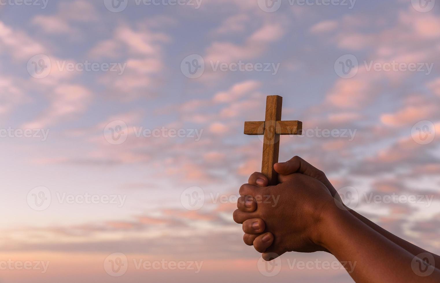 Silhouette of woman hand praying spirituality and religion, female worship to god. Christianity religion concept. Religious people are humble to God. Christians have hope faith and faith in god. photo