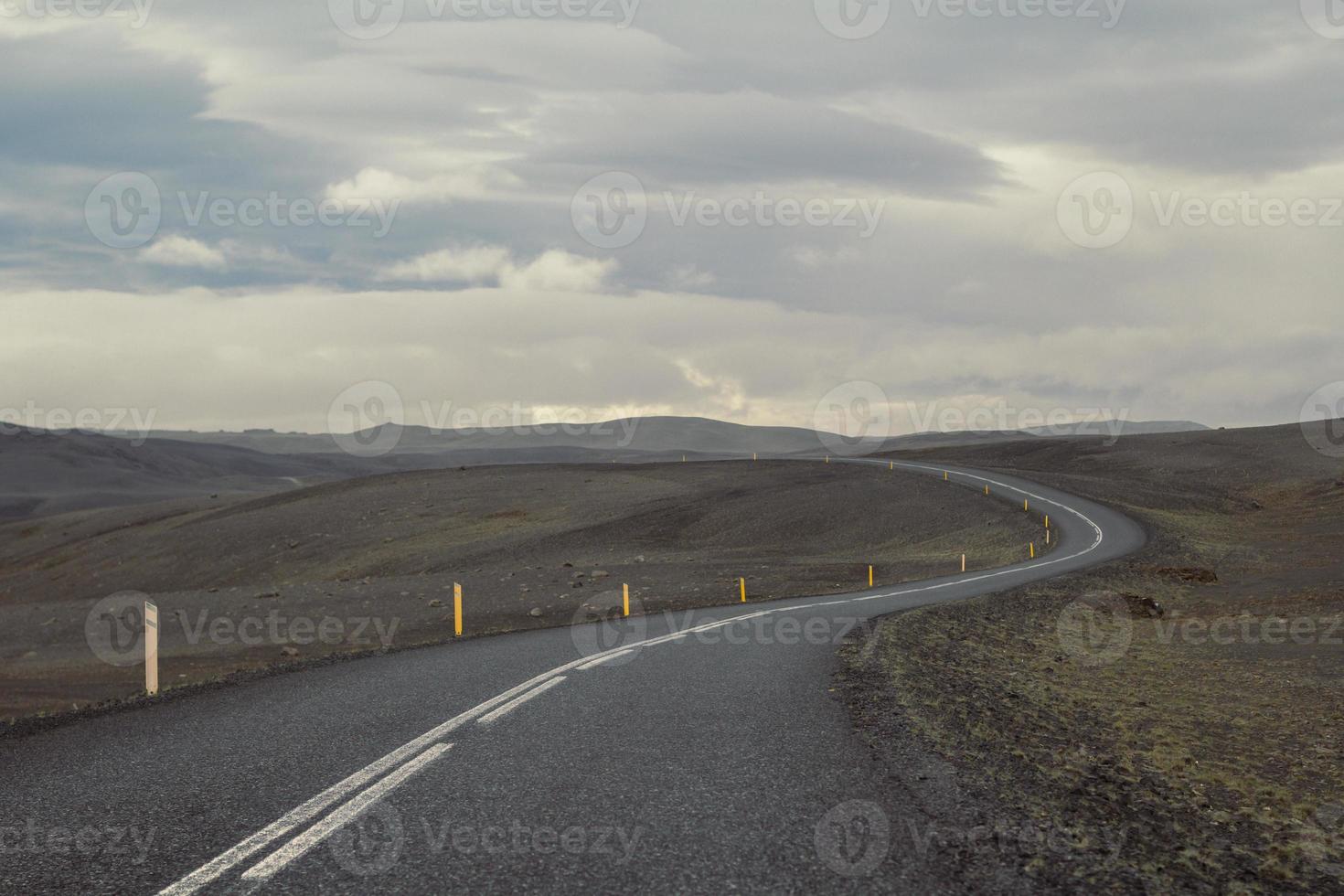 Empty road across hills landscape photo