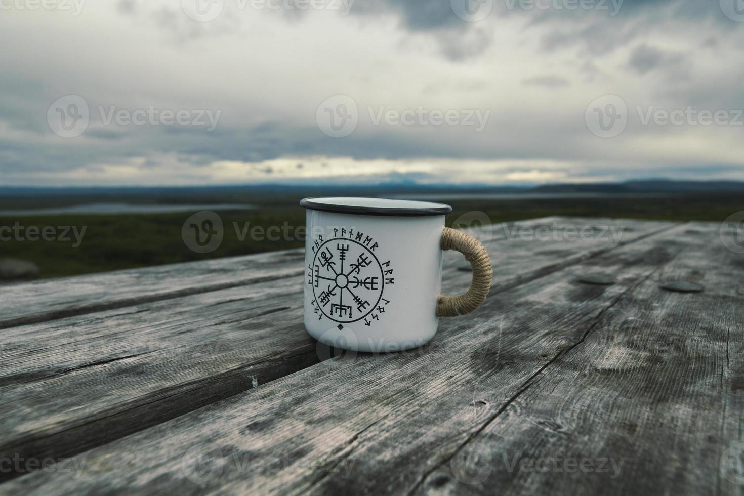 Close up mug on wooden table concept photo