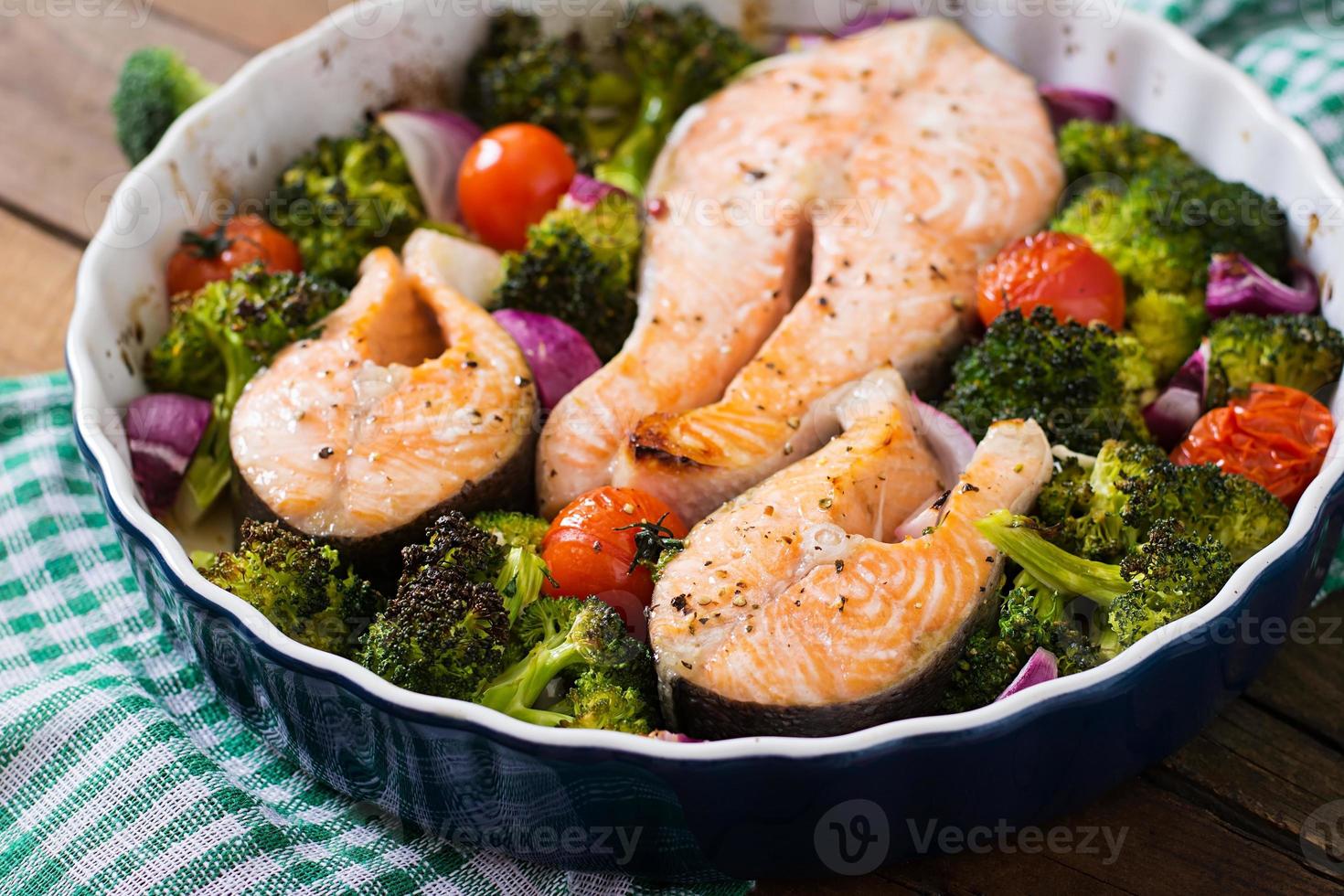 Baked salmon steak with vegetables. Diet menu. photo