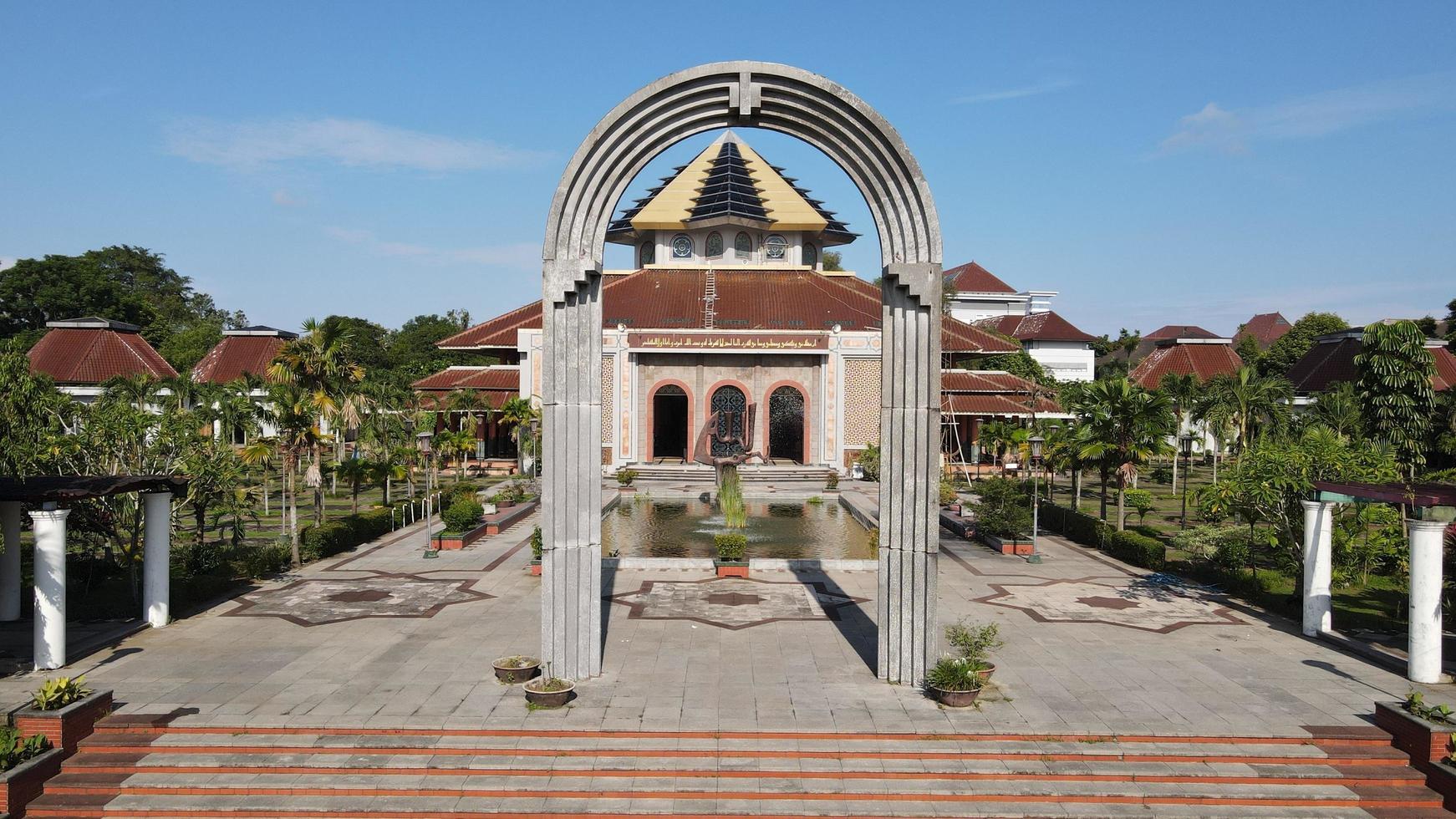 Yogyakarta, Indonesia - November 29, 2022  Aerial view of Gadjah Mada University Mosque. quiet, peaceful atmosphere on a sunny morning. photo