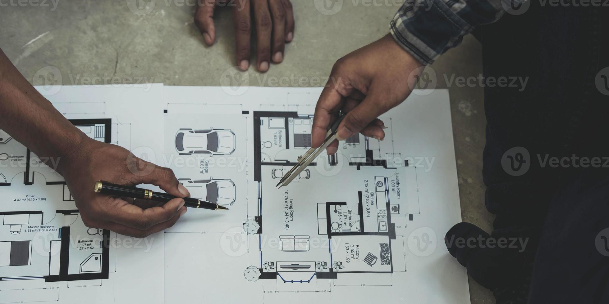 Engineer Teamwork Meeting, Drawing working on blueprint meeting for project working with partner on model building and engineering photo