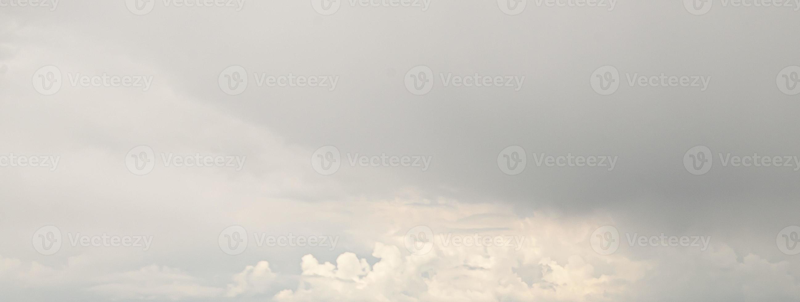 Image of a partly cloudy and partly clear sky during the day photo