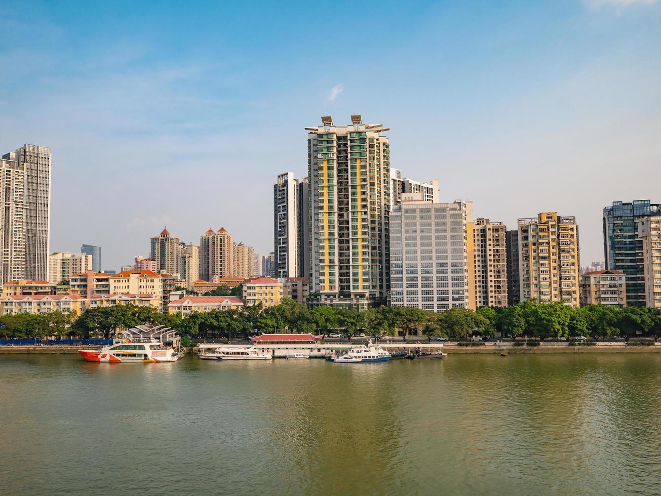 Cityscape of Guangzhou city with pearl river.Guangzhou also known as Canton and formerly romanized as Kwangchow or Kwong Chow, is the capital and most populous city of the province of Guangdong photo
