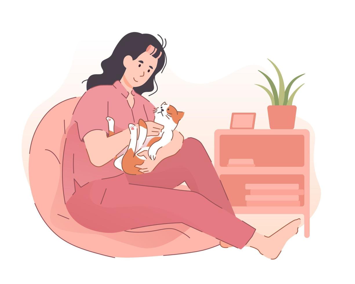 Woman cuddling her cute cat at home. People spending time with pet vector
