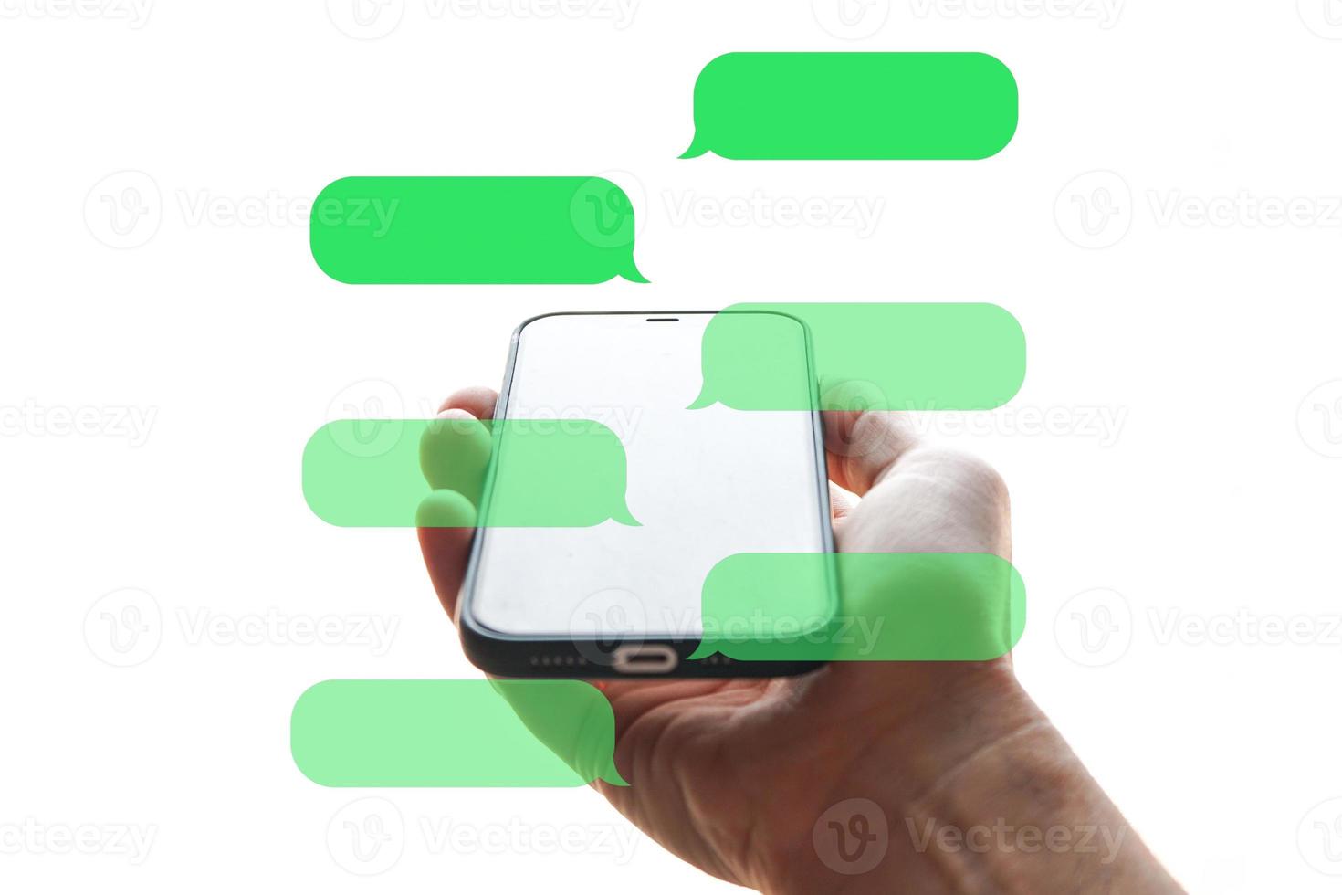 hand holding a smartphone with chat symbol, texting on the phone, phone addiction photo