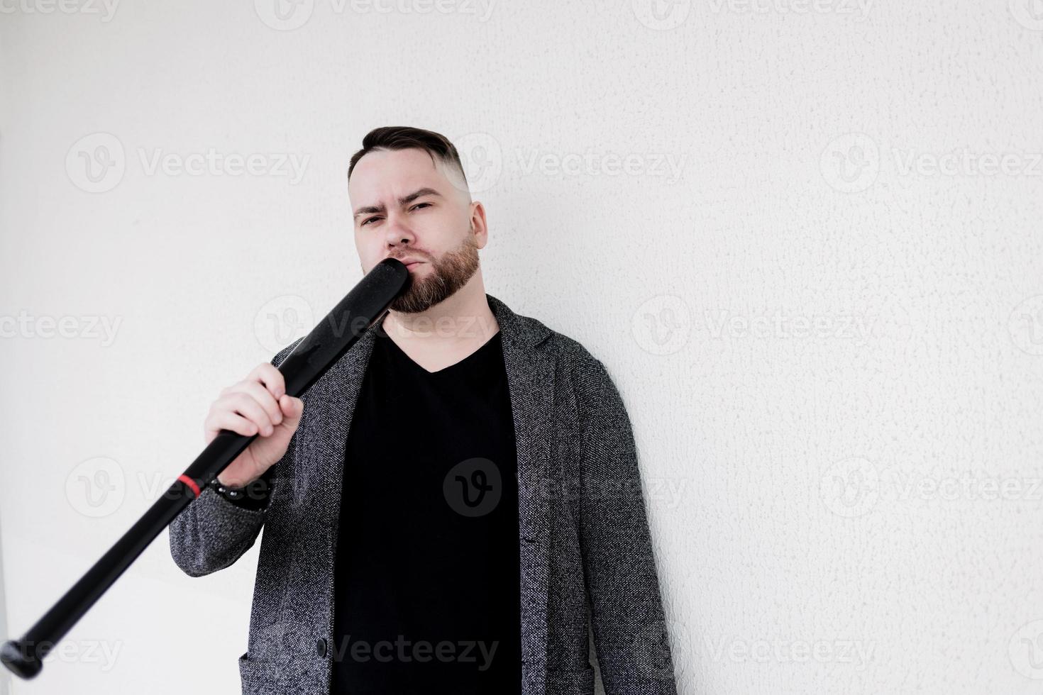 a brutal man with a baseball bat photo