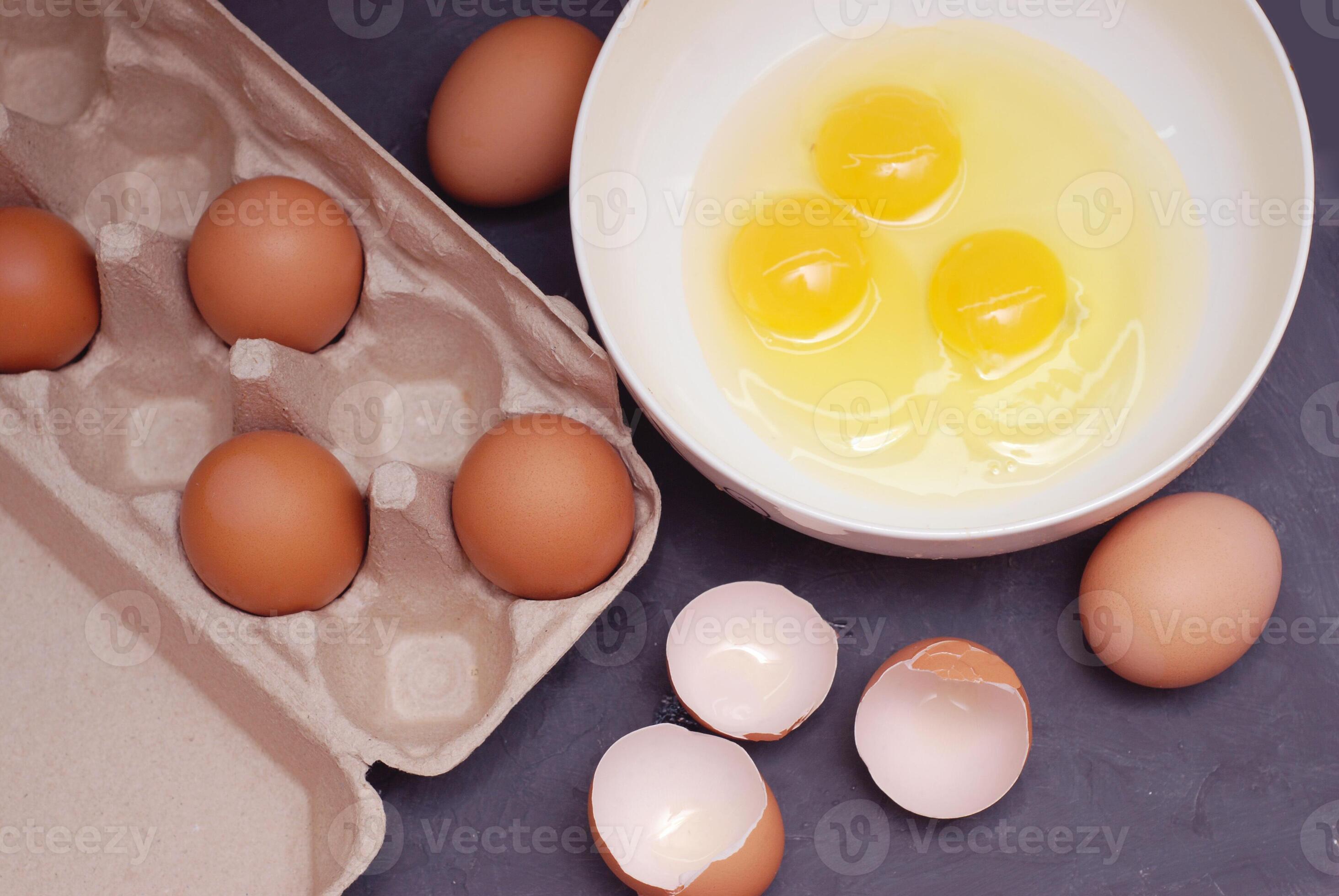 Whipping Chicken Eggs. Yolks and Egg protein in a Cup. Preparation of