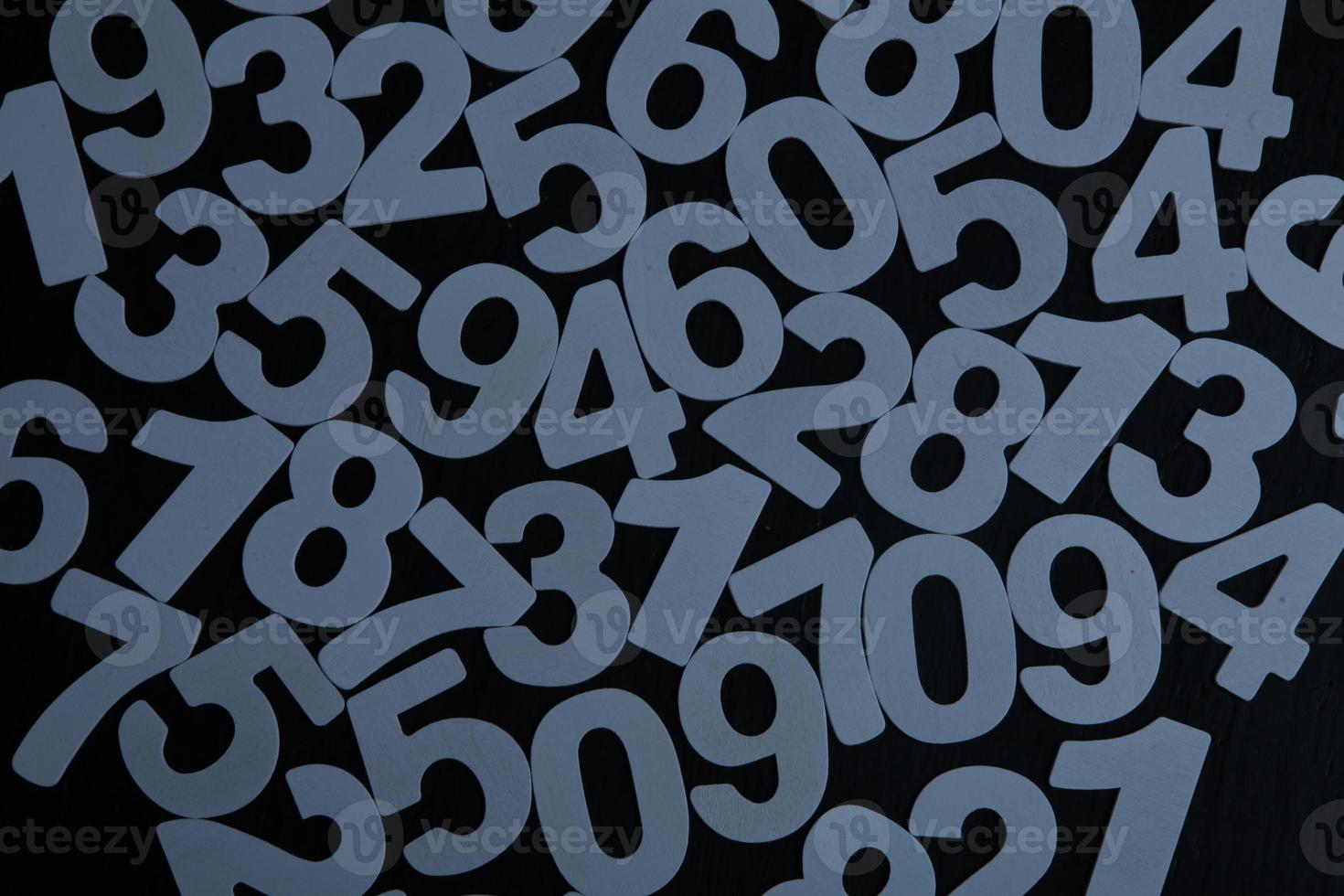 Background of numbers. from zero to nine. Numbers texture. Finance data concept. Mathematic. Seamless pattern with numbers. financial crisis concept. Business success. photo