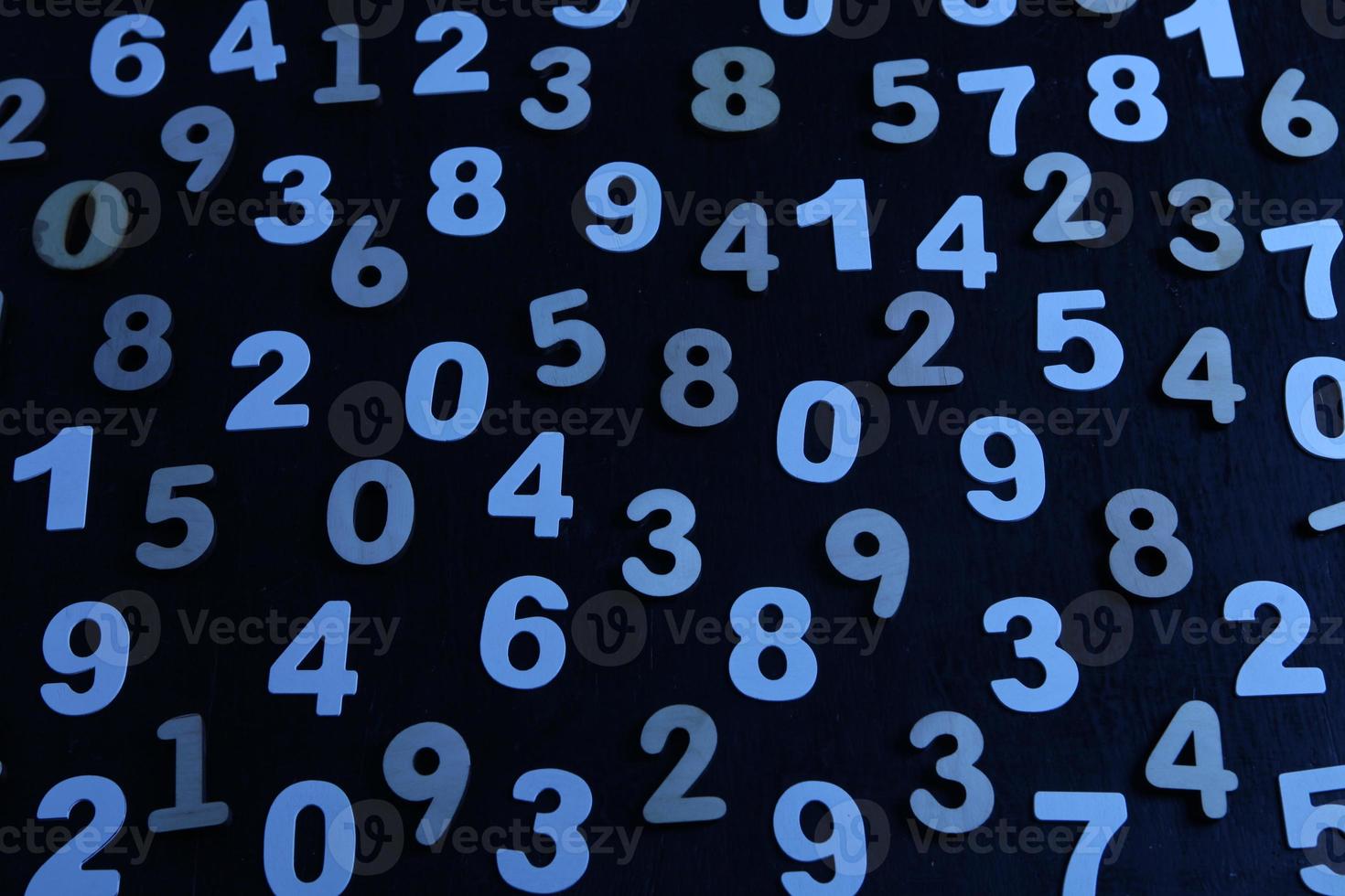 Background of numbers. from zero to nine. Numbers texture. Finance data concept. Mathematic. Seamless pattern with numbers. financial crisis concept. Business success. photo