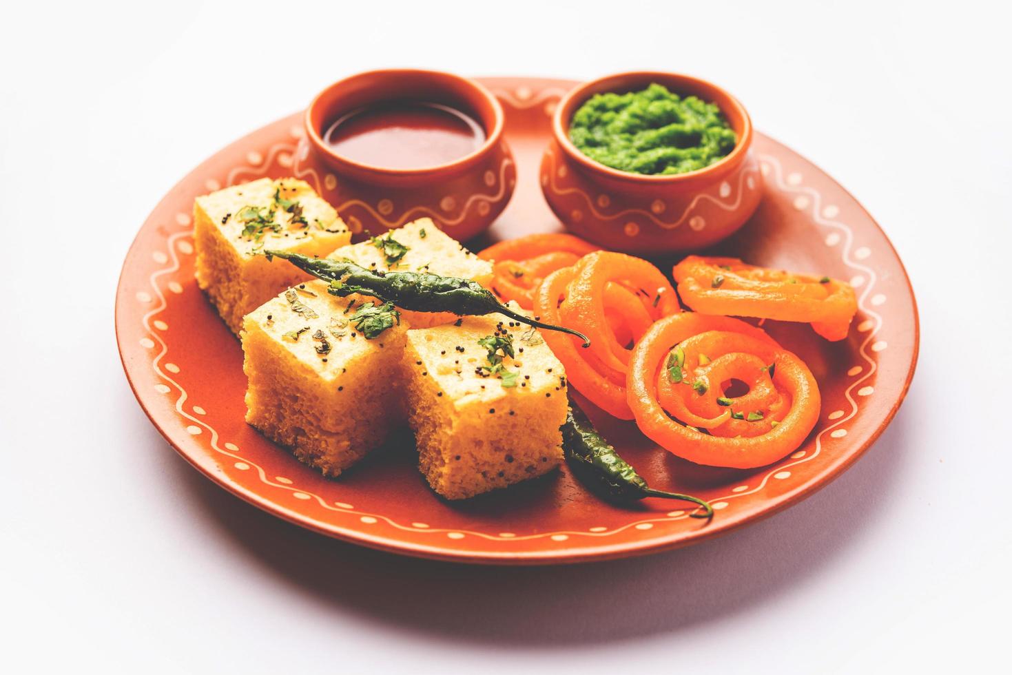 Khaman Dhokla with Jalebi or imarti, popular snack combination from India photo