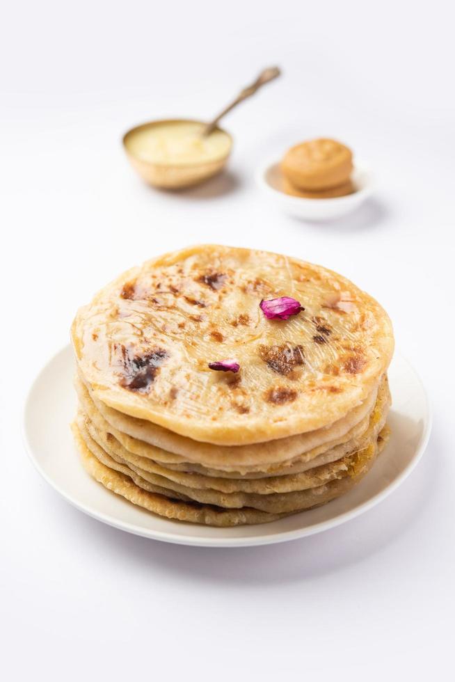 Sweet Khoya roti or Peda chapati paratha made using thickened cream milk or Khoa, khowa, mawa photo