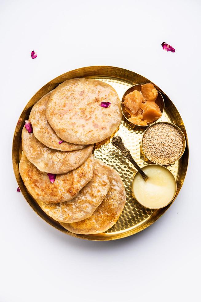 Til Gul roti for Makar Sankranti. Sweet Chapati, poli made using Sesame seeds, jaggery photo
