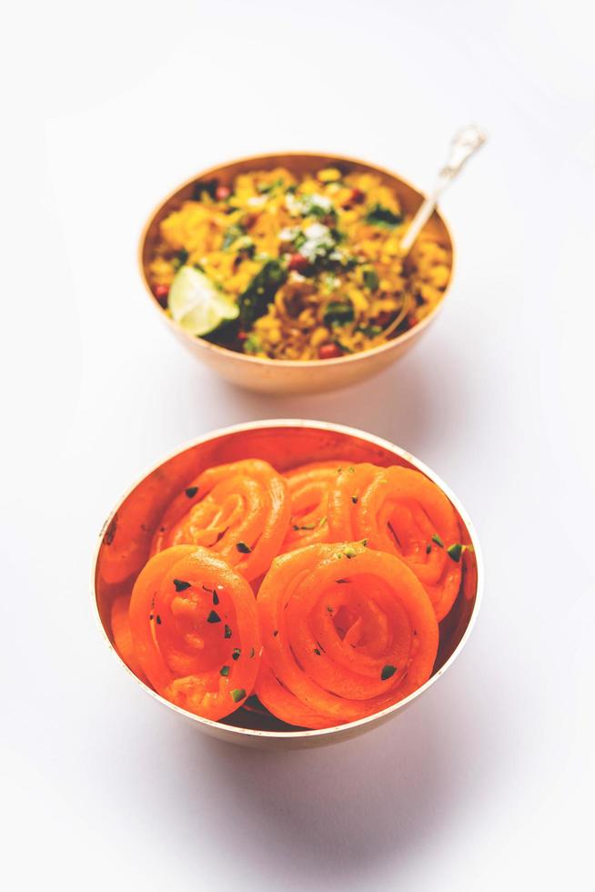 Aloo Poha with Jalebi, snack combination also called imarti and kande pohe photo