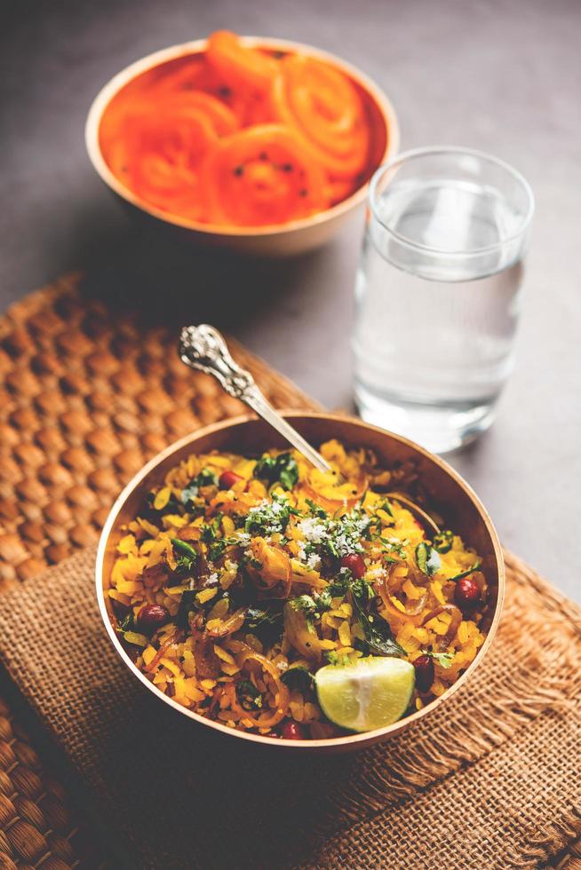 Aloo Poha with Jalebi, snack combination also called imarti and kande pohe photo