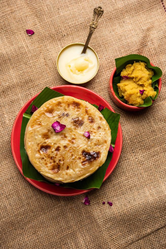 Puran poli, Puran roti, Holige, Obbattu, or Bobbattlu, is Indian sweet flatbread from Maharashtra photo