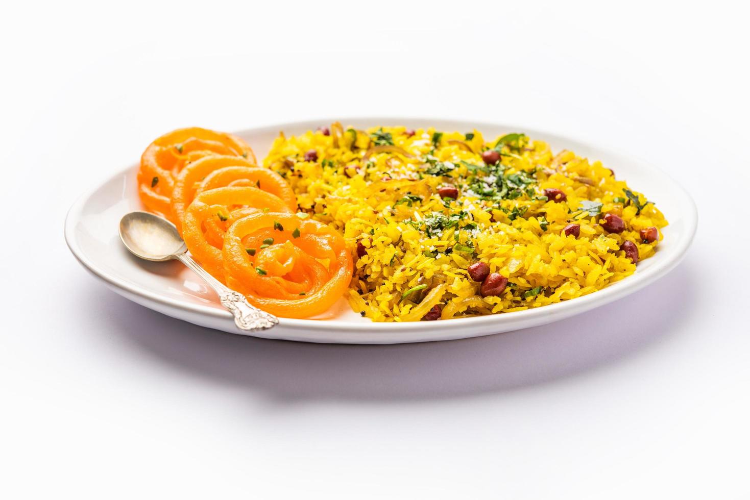 Aloo Poha with Jalebi, snack combination also called imarti and kande pohe photo