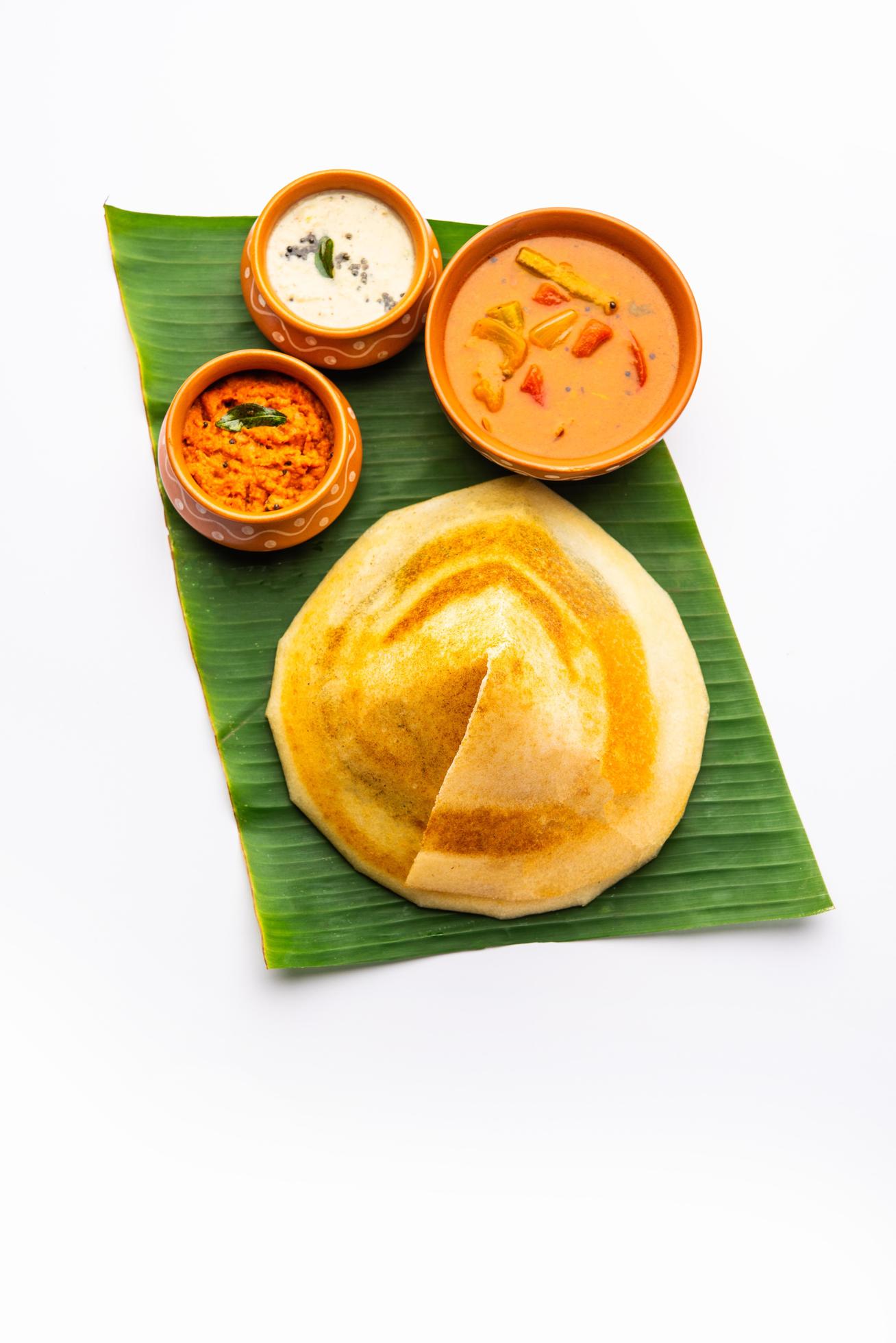 Cone shape dosa, also called dosai, dosey, or dosha, is a thin pancake