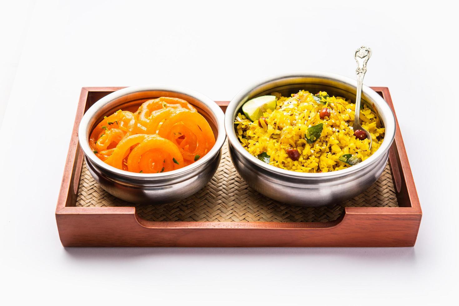 Aloo Poha with Jalebi, snack combination also called imarti and kande pohe photo