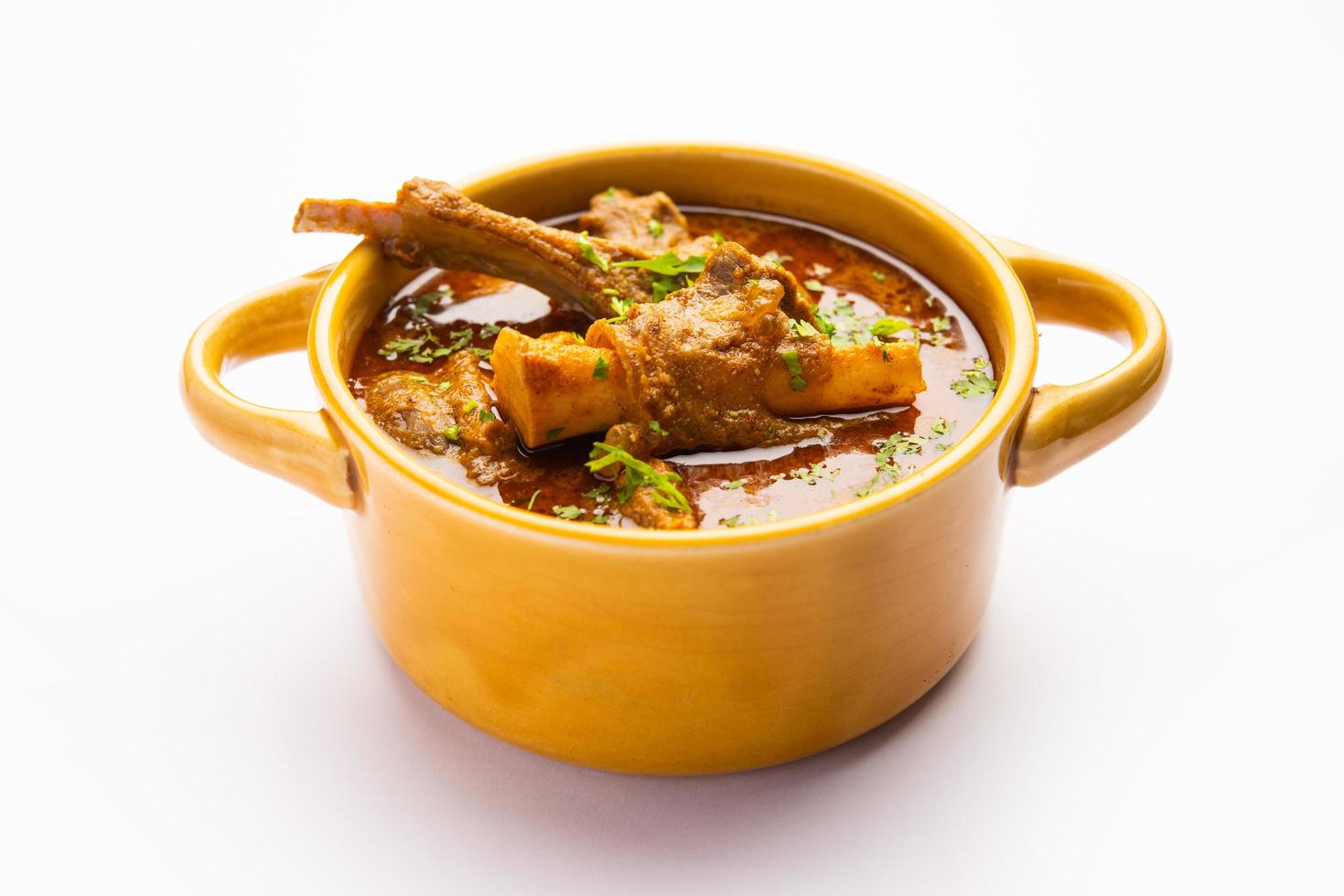 Indian style Mutton OR Gosht Masala OR indian lamb meat rogan josh served with Naan photo