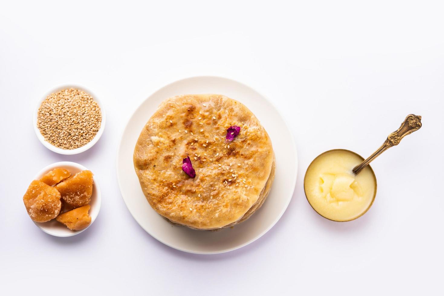 Til Gul roti for Makar Sankranti. Sweet Chapati, poli made using Sesame seeds, jaggery photo