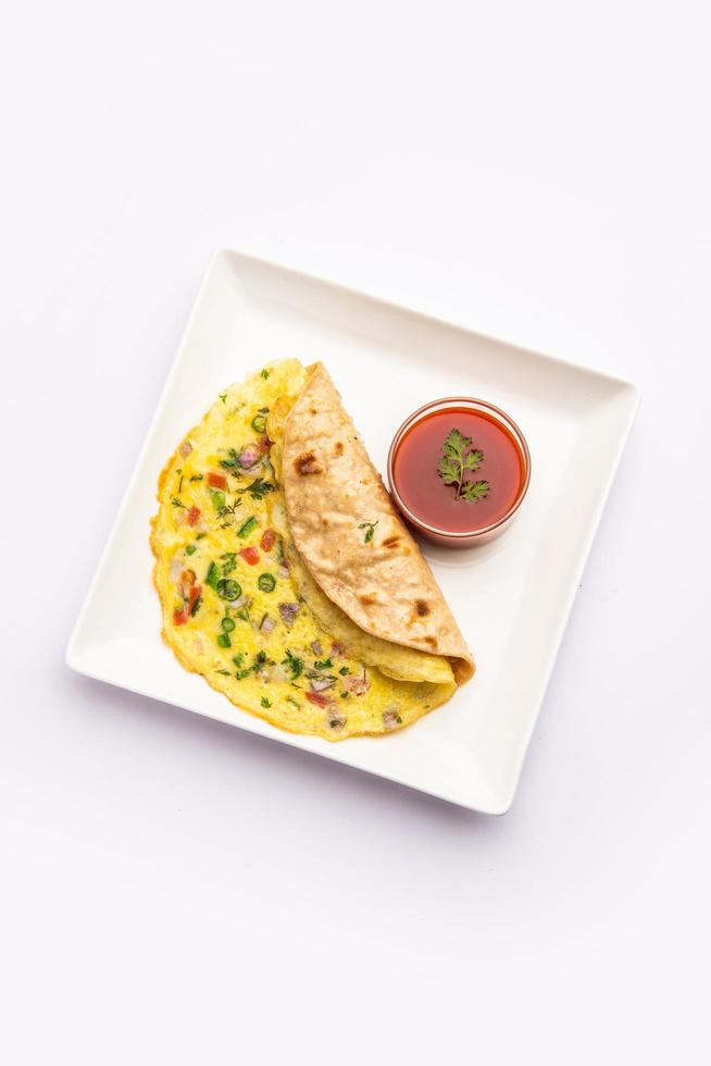 Omelette chapati roll or Franky. Indian Popular, quick healthy recipe for kid's tiffin or lunch box photo