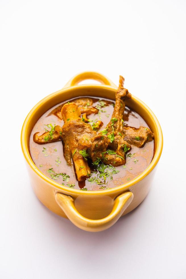 Indian style Mutton OR Gosht Masala OR indian lamb meat rogan josh served with Naan photo