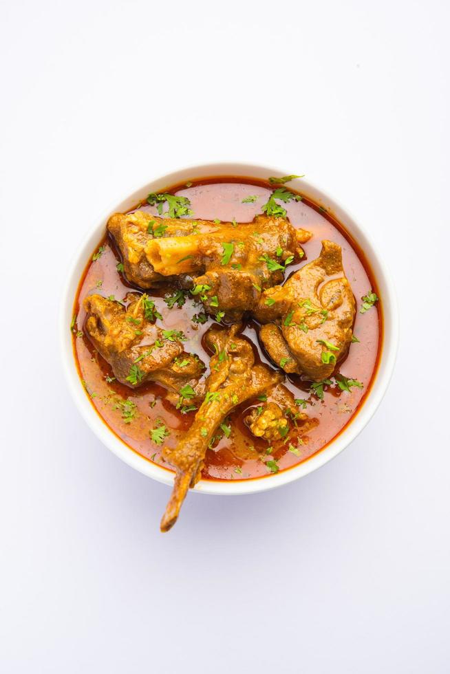 Indian style Mutton OR Gosht Masala OR indian lamb meat rogan josh served with Naan photo