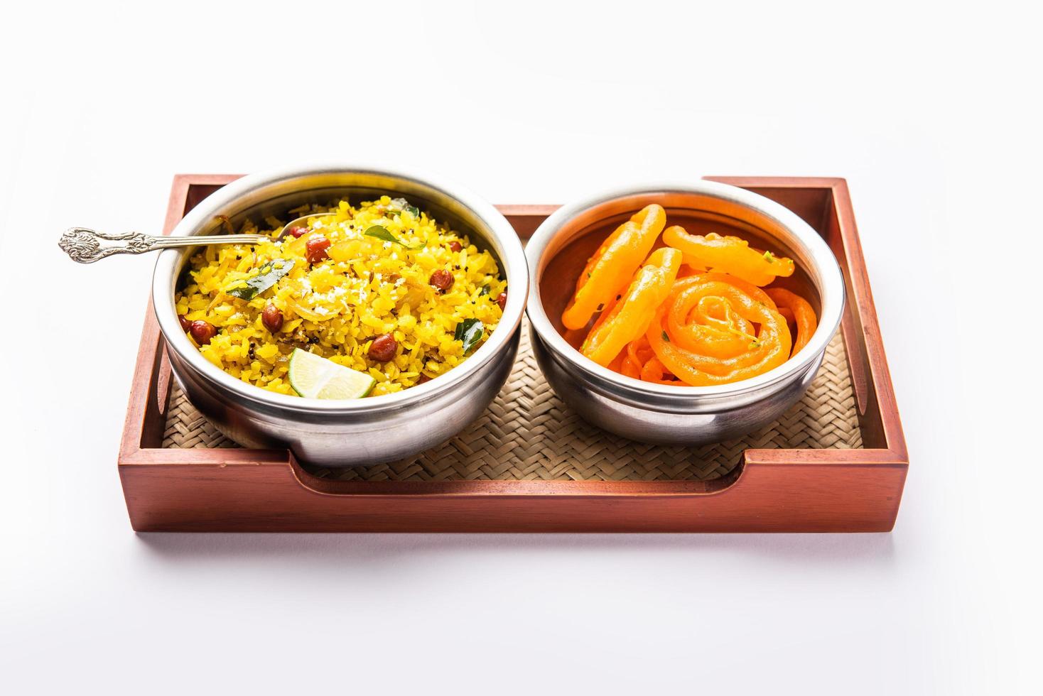 Aloo Poha with Jalebi, snack combination also called imarti and kande pohe photo