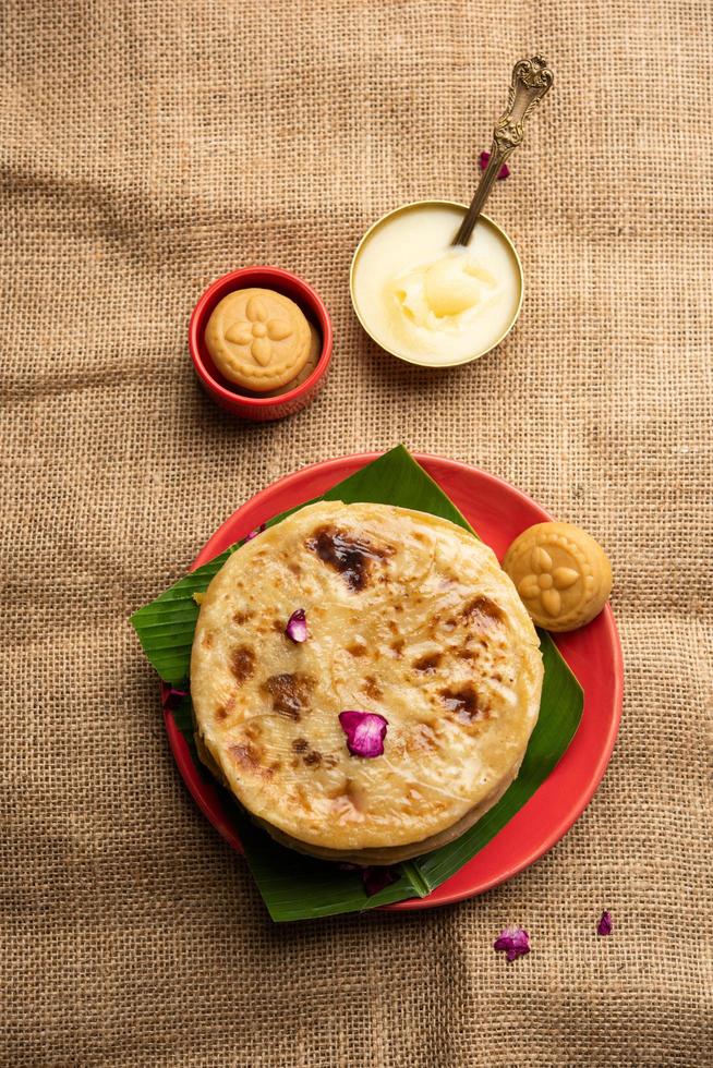 Sweet Khoya roti or Peda chapati paratha made using thickened cream milk or Khoa, khowa, mawa photo