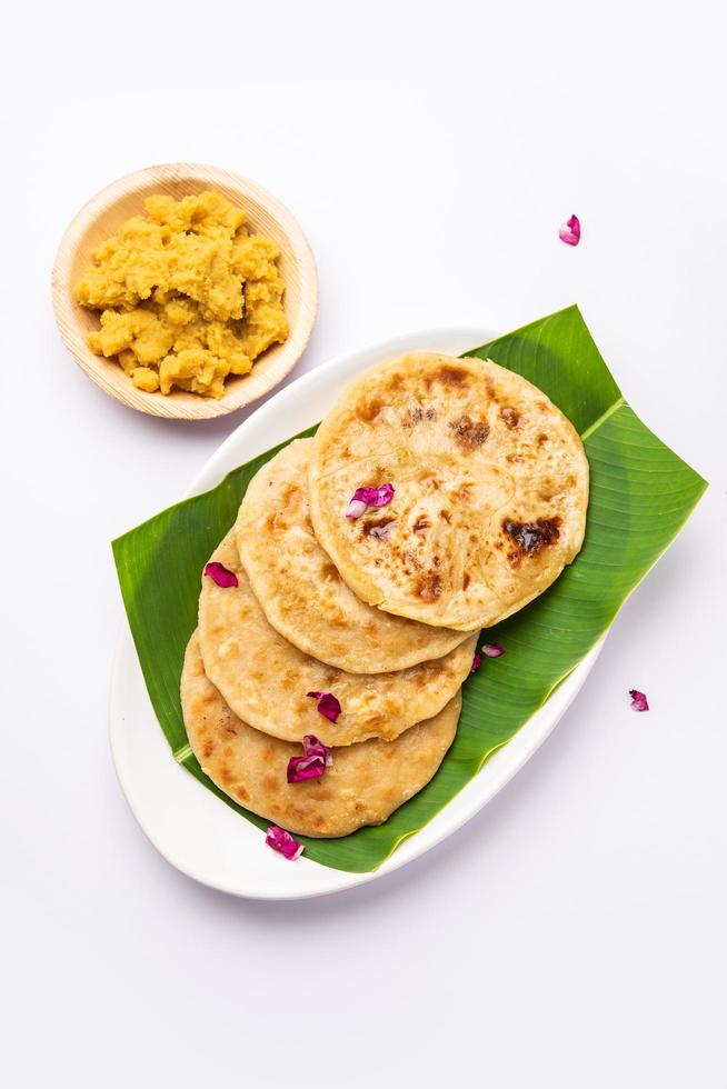 Puran poli, Puran roti, Holige, Obbattu, or Bobbattlu, is Indian sweet flatbread from Maharashtra photo