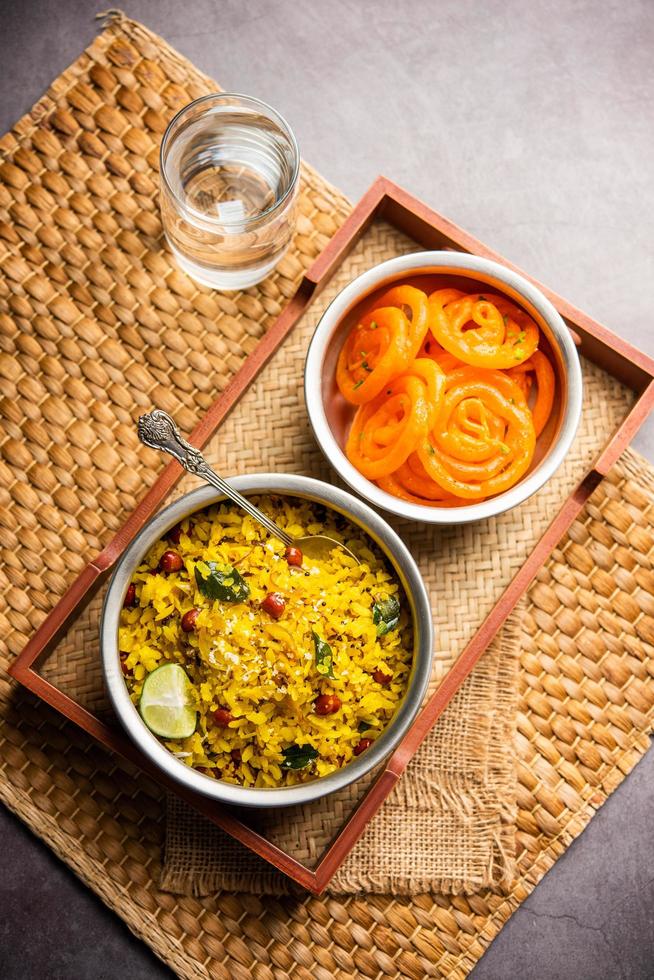 Aloo Poha with Jalebi, snack combination also called imarti and kande pohe photo