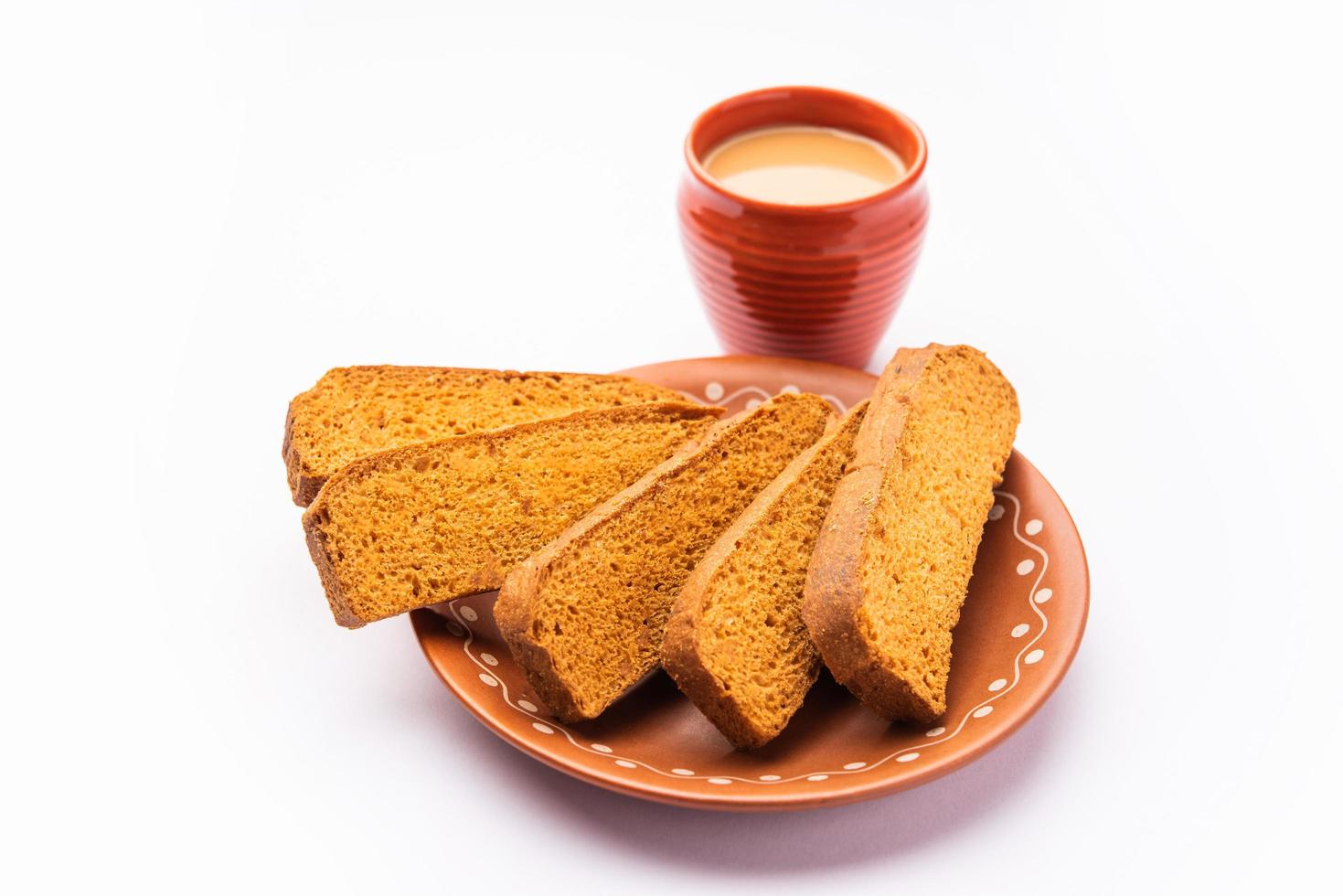 Crispy cake rusk or Delhi toast with masala tea 15933774 Stock Photo at Vecteezy