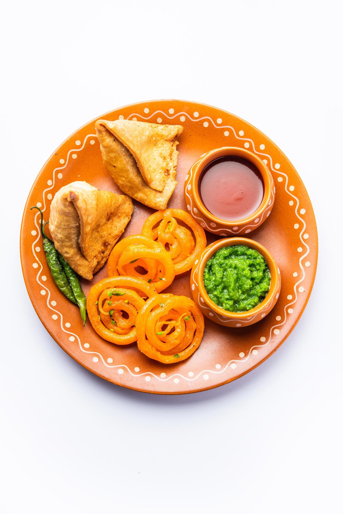 Veg Samosa with Jalebi, snack combination also called imarti and ...