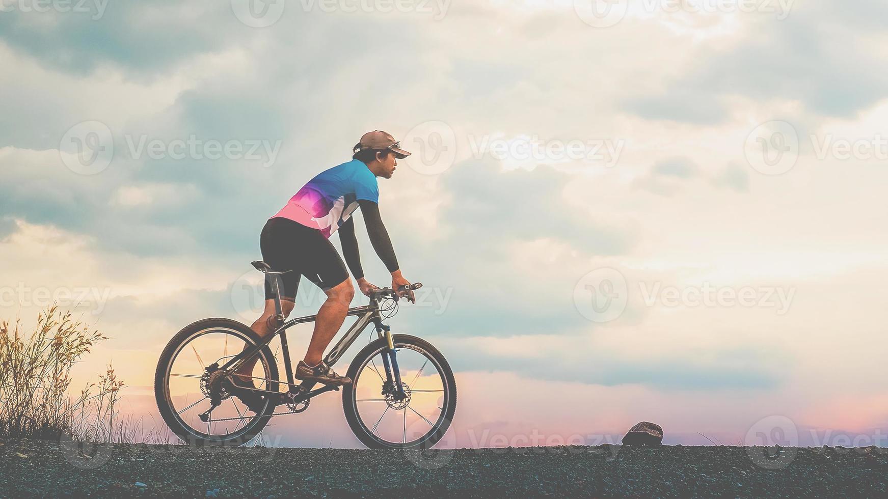 Man riding a mountain bike in tourism photo
