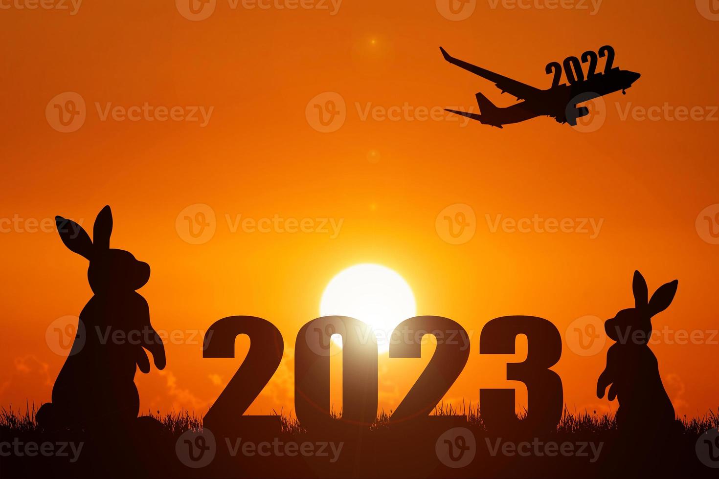 The concept of moving through 2022 to 2023. Happy New Year 2023. photo